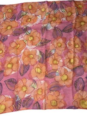 Vibrant, sheer pink square scarf with an orange and peach watercolor floral